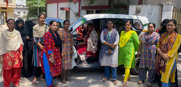 Women Driving Electric Autos Promoting Economic Empowerment